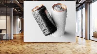 Black and white beverage cans with metallic lids covered in condensation on a light background Wall mural