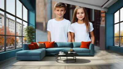 Children in white T-shirts. Kids t-shirts mockup. Wall mural