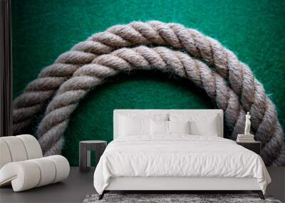 Rope on colorful green background Wall mural