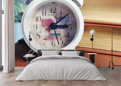 alarm clock and books Wall mural