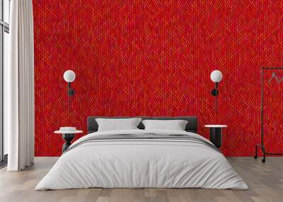 Bright knitted texture on red background. Wall mural