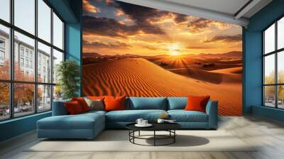 A desert landscape with a cloudy sky and a sun setting in the background Wall mural