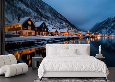 Norwegian fjord village at night with lights reflecting in the water Wall mural