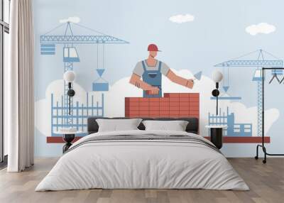 Builder builds brick wall. Worker in uniform and helmet work with trowel, male character on crane builds skyscraper background home renovation flat vector cartoon concept Wall mural