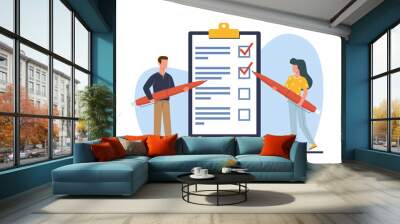 Man and woman hold pens and write down goals to achieve or make to do list. Tiny people with huge checklist, red pencil and clipboard paper. Cartoon flat style isolated png concept Wall mural