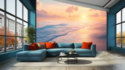 A beautiful sunset over the ocean with soft clouds and the sun shining through. Wall mural