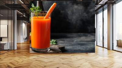 Glass of fresh carrot juice with carrots and parsley on a rustic wooden surface. Wall mural