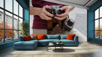 A man is holding a tourist map.  Wall mural