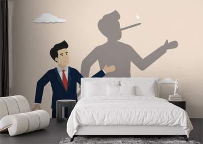 Honesty, liar, fake or business fraud, false information, hiding the truth concept, dishonesty businessman lying with Pinocchio long nose shadow. Wall mural