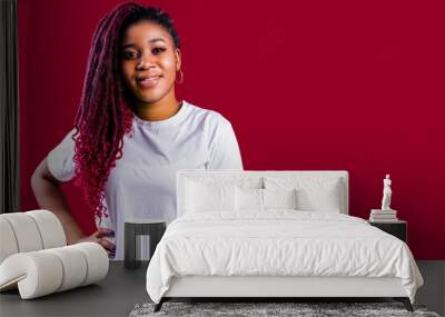 Awesome african woman with dreadlocks in studio wear white cotton t-shirt Wall mural