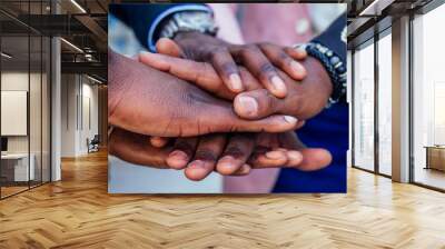 hands closeup of group black afro american friends men businessmen in stylish business suit, expensive wristwatch handshake teamwork .concept of successful business and good deal Wall mural