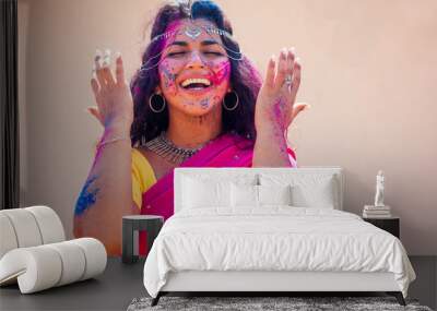 holi festival of colours. portrait of happy indian girl in traditional hindu sari on holi color . in Wall mural