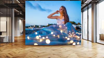 mermaid myth in sunset on beach shore with fish star shells pearls earrings jewelry Wall mural