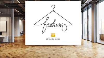 Creative fashion logo design. Vector sign with lettering and hanger symbol. Logotype calligraphy Wall mural