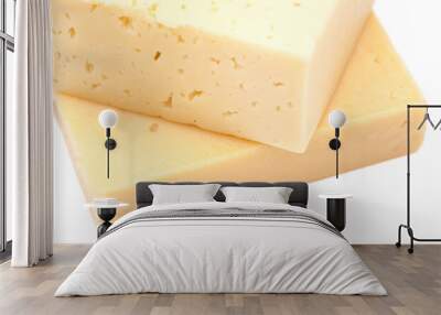 cheese slices on white background Wall mural