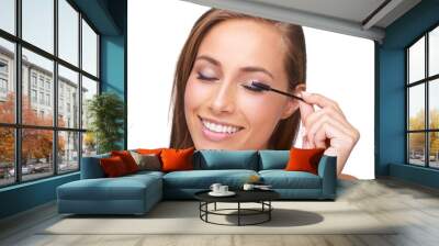 Mascara, lashes and woman with makeup and beauty, microblading with eyelash brush isolated on white background. Portrait, smile and eyes, cosmetic care and cosmetics tools with skincare closeup Wall mural