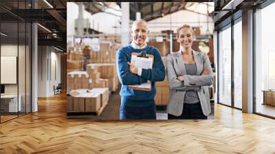 Your shipment is in capable hands. Portrait of two managers standing in a distribution warehouse. Wall mural