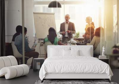 Any questions. Shot of a group of coworkers in a boardroom meeting. Wall mural