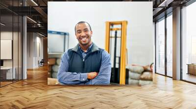 My factory floor is a well-oiled machine. Portrait of a smiling factory worker. Wall mural