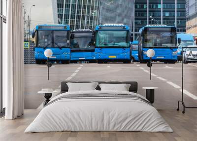 buses move along a multi-lane avenue Wall mural