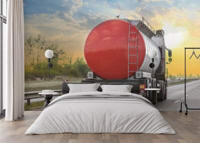 Fuel truck moves along the road Wall mural