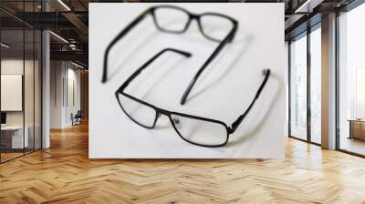 Two glasses for vision on a white background Wall mural