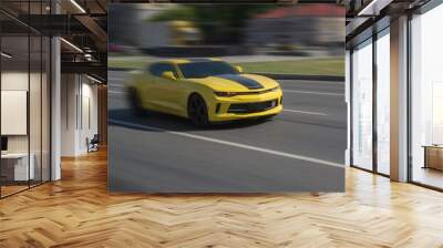 Yellow sports car racing down the city street Wall mural