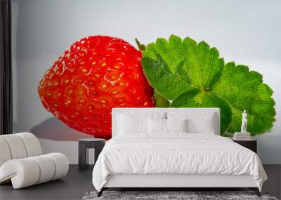 Fresh strawberries are rich in vitamin C. The white background brings out the vibrant red color of the strawberries. Delicious strawberries packed with flavor and nutrients Wall mural