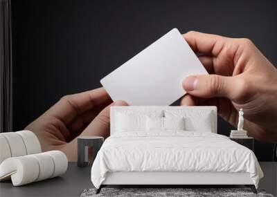 male hand holding white card business card Wall mural