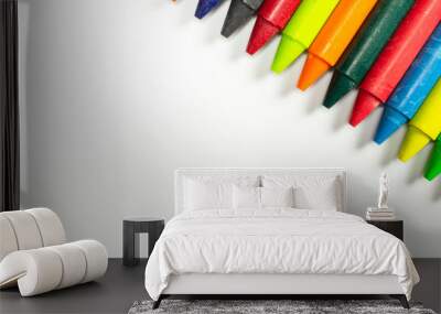 Colourful bright wax pencils isolated on white, close-up selective focus. Wall mural