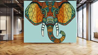 Elephant from the front with two tusks and trunk. Multi-color abstract image of an elephant head with a black outline. It may be used for design of a t-shirt, bag, postcard, a poster, banner. Vector. Wall mural