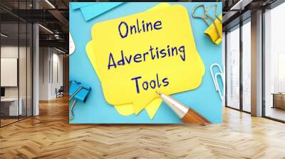 Business concept meaning Online Advertising Tools with sign on the piece of paper. Wall mural