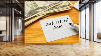 Financial concept about Get out of Debt with phrase on the page. Wall mural