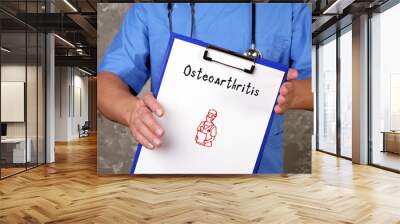 Health care concept meaning Osteoarthritis  with sign on the piece of paper. Wall mural