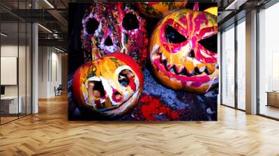 art scary Halloween with pumpkins and an old kerosene lamp in a red light preparation for the celebration in a dark room  Wall mural