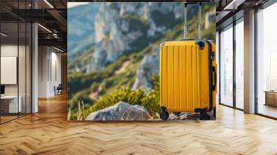 yellow travel suitcase on wheels on outdoor background Wall mural