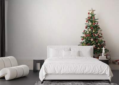 A festive Christmas tree adorned with ornaments and surrounded by wrapped gifts stands in a minimalist living room setting, creating a cozy holiday atmosphere. Perfect for holiday season visuals. Wall mural