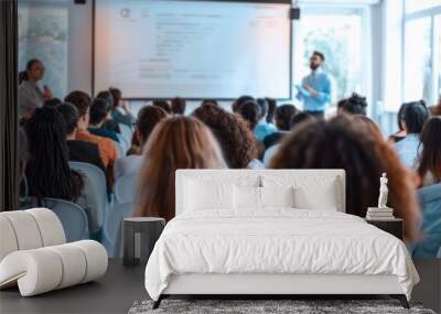 A large group of diverse attendees are present at a professional business seminar featuring presentations, speakers, and modern technology in an indoor setting for networking and learning Wall mural