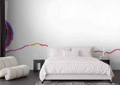 A ball of multi-colored motley melange woolen threads, isolated on a white background. Side view. Wall mural