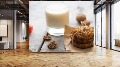 Homemade oatmeal cookie served with cup of milk Wall mural