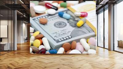 Money bundle (pack) among various drugs Wall mural