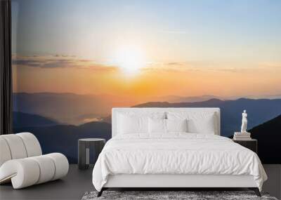 mountain valley in blue mist at the sunrise Wall mural