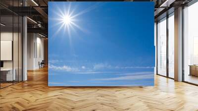 sparkle sun on blue cloudy sky background Wall mural