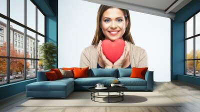 Beautiful woman hold red heart. Valentine day love concept. Wall mural