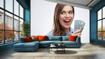 Close up face portrait of smiling woman holding money dollar cas Wall mural