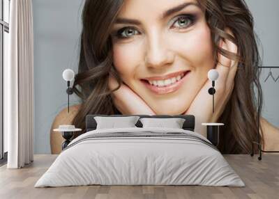 Female model studio posing.Beauty smiling woman face portrait. Wall mural