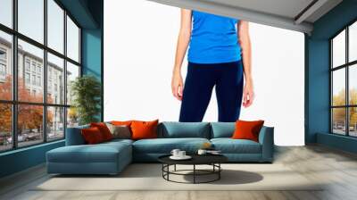 fitness woman in sport style standing against white background Wall mural