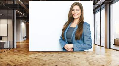 Smiling business woman portrait with folded hand. Wall mural