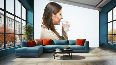 Smiling woman water glass. White background Wall mural