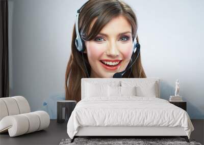 Woman call center operator. Young smiling female worker. Busine Wall mural